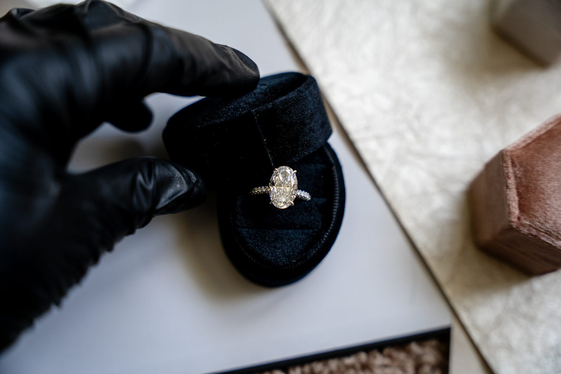 Ring detail with black gloves