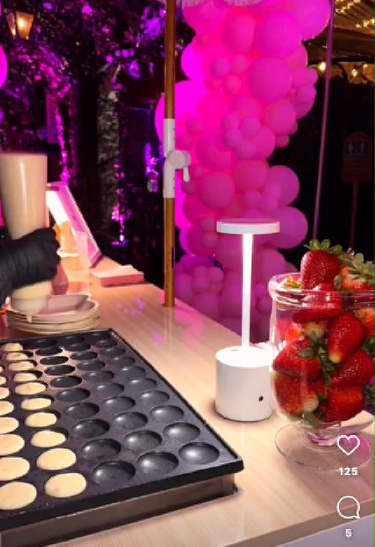 Live mini pancake griddle station at an event by Lilly's Mini Pancakes